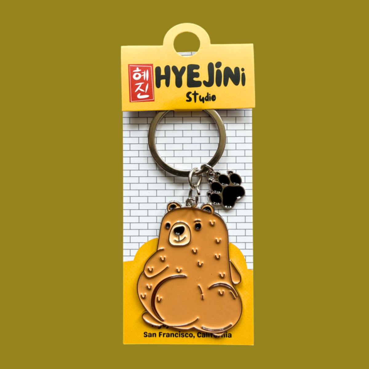 Cuddly Bear keychain in Hyejini Studio packaging