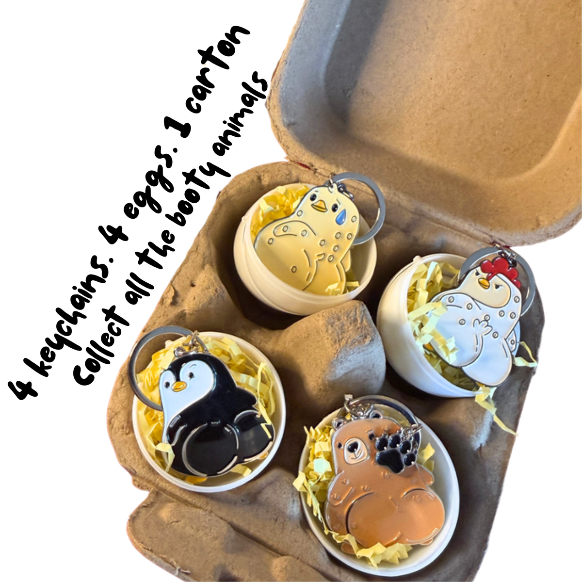 Four Cheeky Collection keychains in plastic eggs inside an egg carton