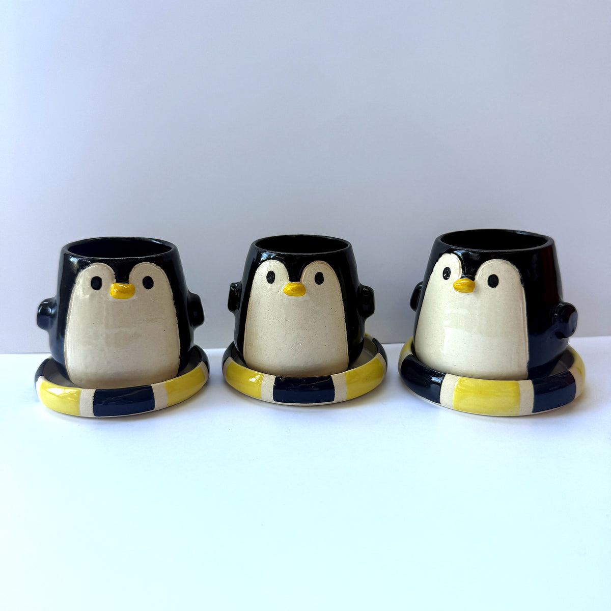 Mischievous Penguin Mini Cup